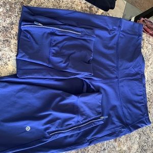 LuLu full length tights , zippered cuffs, side pockets . Size 10 good condition